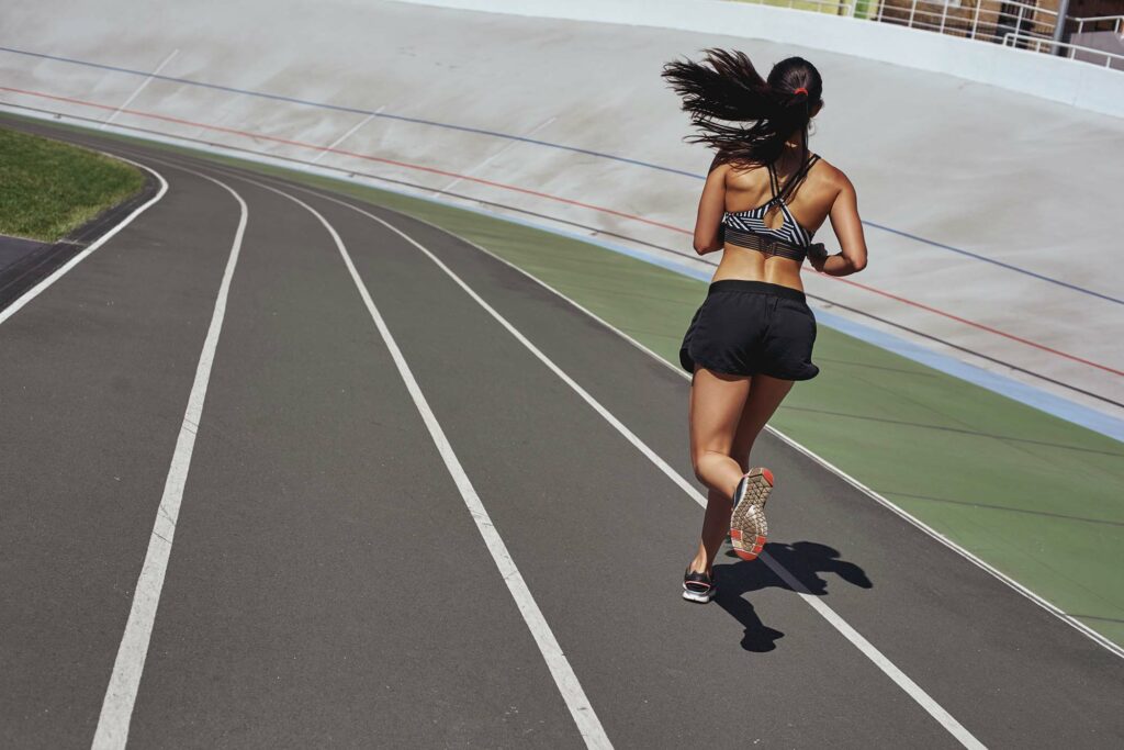 train-your-body-runner-on-the-stadium-track-woma-UU6JGLY.jpg